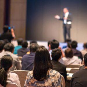 Professional giving a press conference on crisis communication